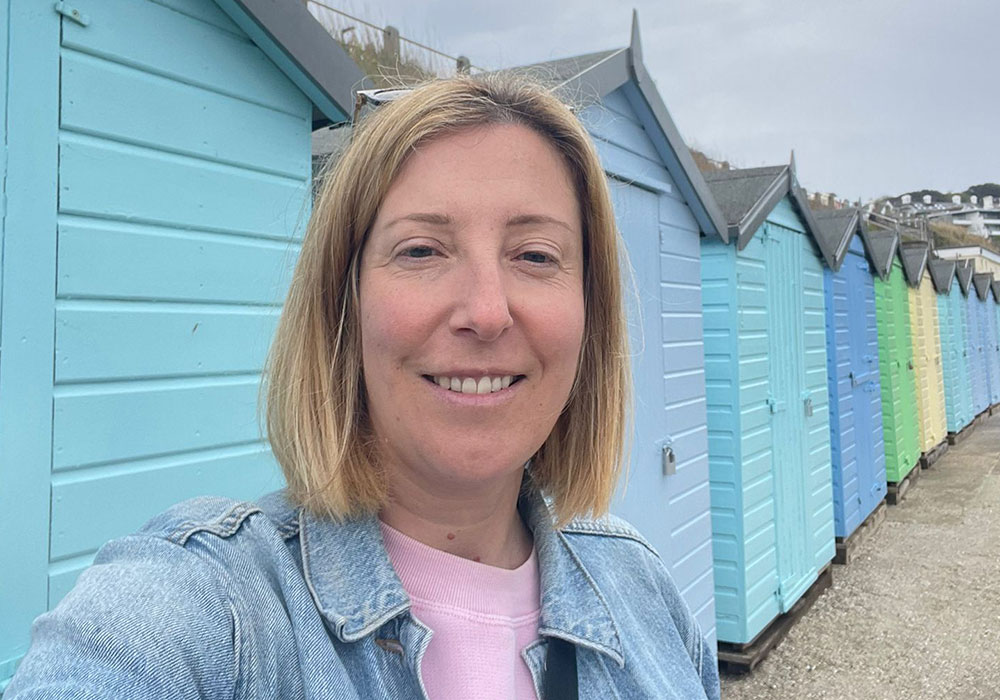 Science Tutor Emma At Beach Huts In Falmouth, Cornwall